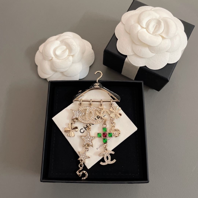 Ch*el brooches